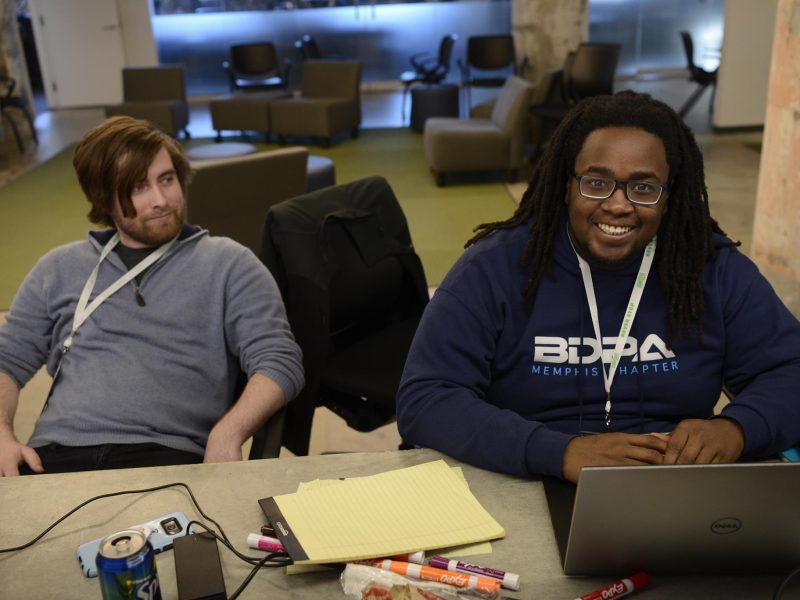 . Kareem Dasilva, right, took home first place honors at the Smarty City: Transportation & Mobility Hackathon on March 15-17 with MemPatch, technology that helps the city streamline identification of potholes. (Submitted)