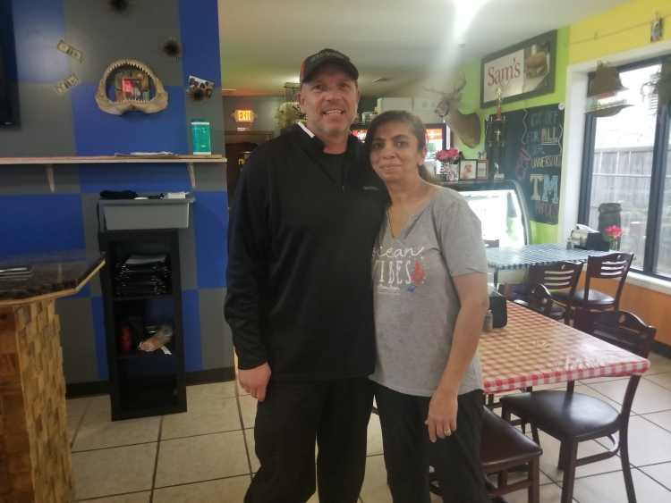 Sam's Deli owner-operators Brad & Shamira Wilbanks pose inside the restaurant. (Baris Gursakal)