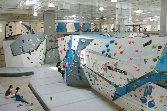 A section of bouldering walls at Memphis Rox gives climbers an opportunity to test themselves without a harness or ropes. (Brandon Dahlberg)