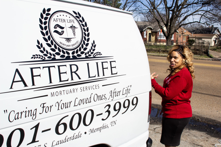 Madeline Lyles opens a truck After Life Mortuary Services uses to transport bodies to the South Memphis facility. (Renier Otto)