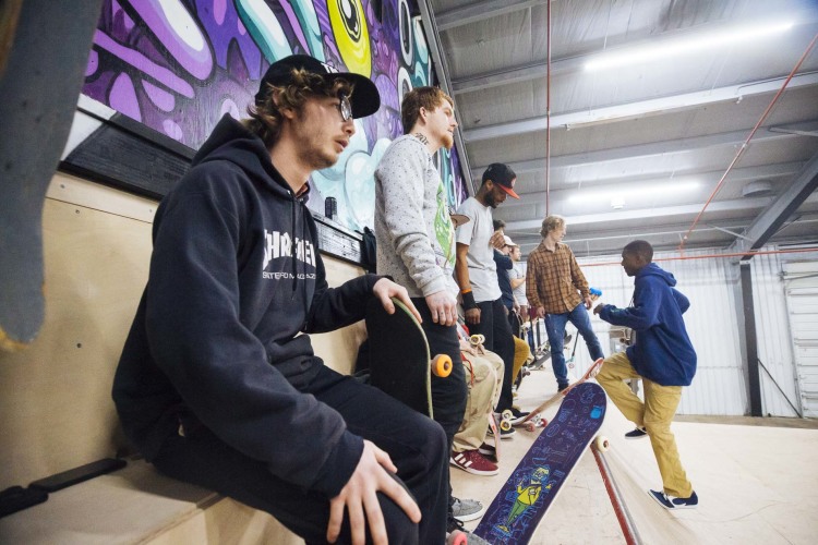 Skaters line the most popular spot to drop into the course at Society Skatepark and Coffee in the Broad Avenue Arts District. (Ziggy Mack)
