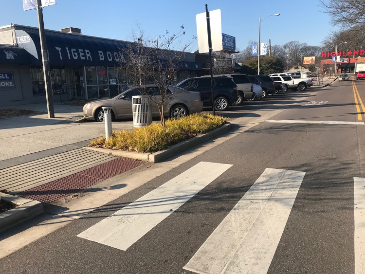 Streetscape improvements on Walker Avenue between the Tiger Bookstore and The Peddler included new crosswalks, beautification, traffic calming and parking reconfiguration to improve the pedestrian experience. (Cole Bradley) 