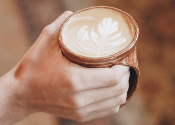 A cup of Belltower Artisans coffee expertly crafted and served in a mug made on location and a available for purchase. (High Ground News)