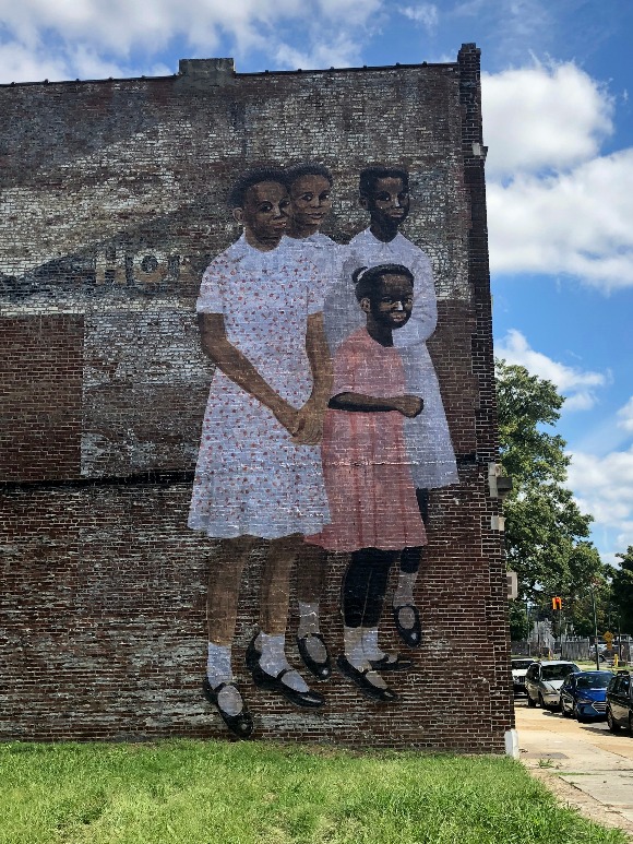 Characters from "The Wedding Party" as seen from G.E. Patterson Avenue.