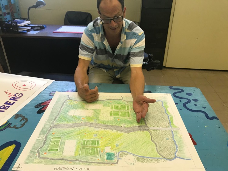 Chris Collier reviews his vision for Gaisman Park, which includes  sports fields and an arboretum. (Cole Bradley)