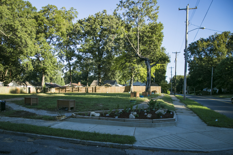 There are several new pocket gardens and parks, like the one at Pope Street and Faxon Avenue, in the area. (Natalie Eddings)