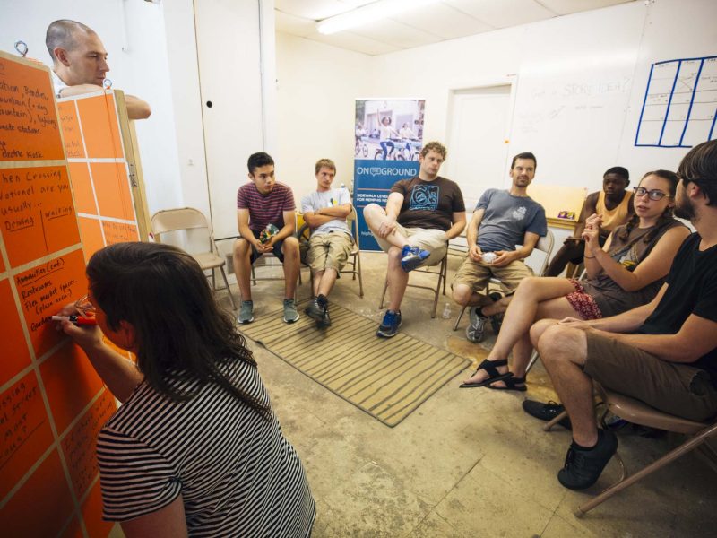 Brett Hunter and Katie Hargrave host a community meeting to reimagine the center of National Street as the Heights Line biking and pedestrian path connecting Summer to Jackson Avenues (Heights Line Design Studio)