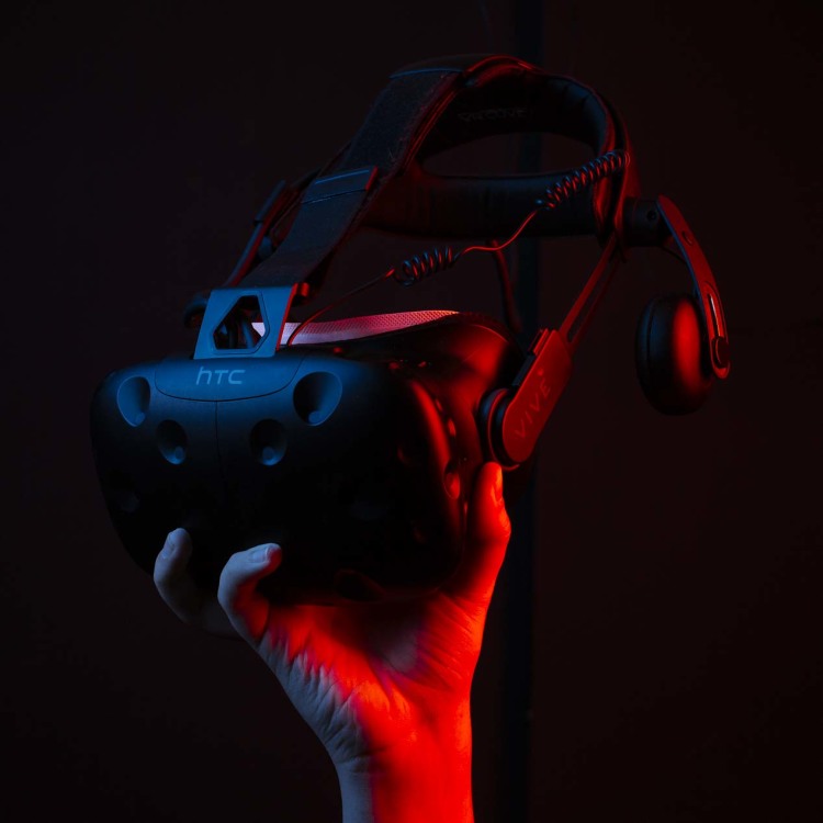 A Bluff City Virtual Reality employee uses reality augmentation equipment at the Cordova location. (Ziggy Mack)