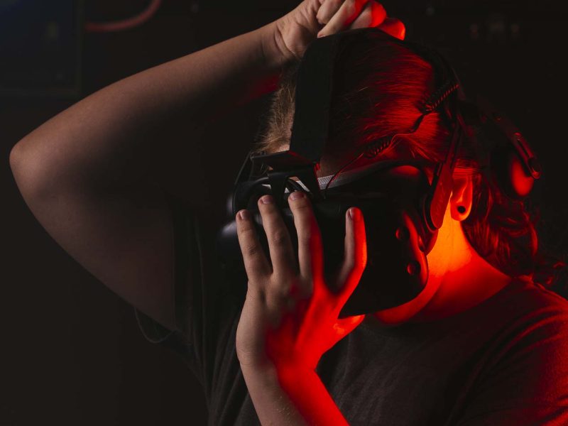 A Bluff City Virtual Reality employee uses reality augmentation equipment at the Cordova location. (Ziggy Mack)