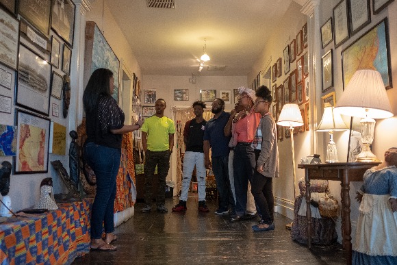 Alana Turner of Slave Haven demonstrates a portion of the museum's tour. (Brandon Dahlberg)