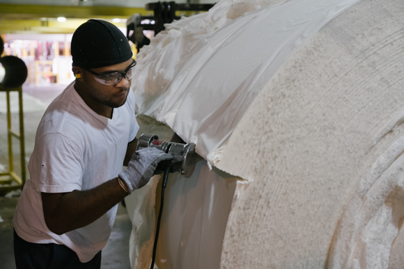 Darrell Brown breaks down a parent roll for recycling. Brown has worked for KTG for eight years. (Brandon Dahlberg)
