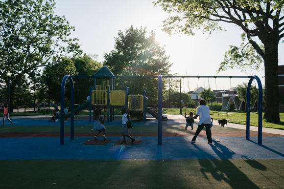 Residents use the Greenlaw Community Center's playground in the afternoon. (Brandon Dahlberger)