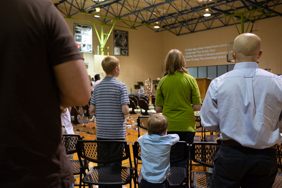Members of the church sing worship songs to begin their morning service at Grace Church Memphis. (Brandon Dahlberg)