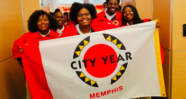 City Year volunteers work with students inside and outside the classroom to help them reach graduation.