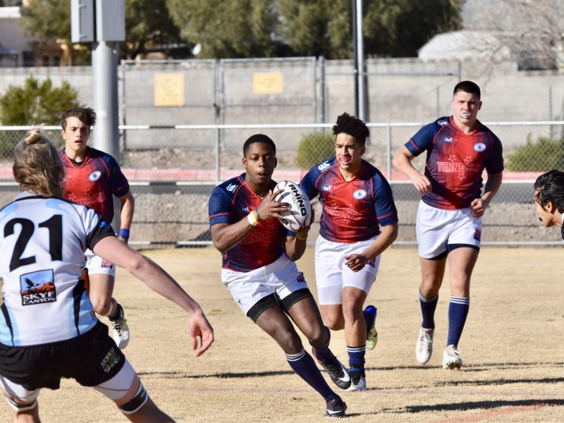 Leroy Taylor (Center) of Power Center Academy plays with Memphis Inner-City Rugby.