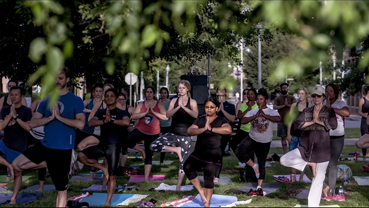 Riverside yoga takes place as part of a Fourth Bluff activation. (Submitted Fourth Bluff)