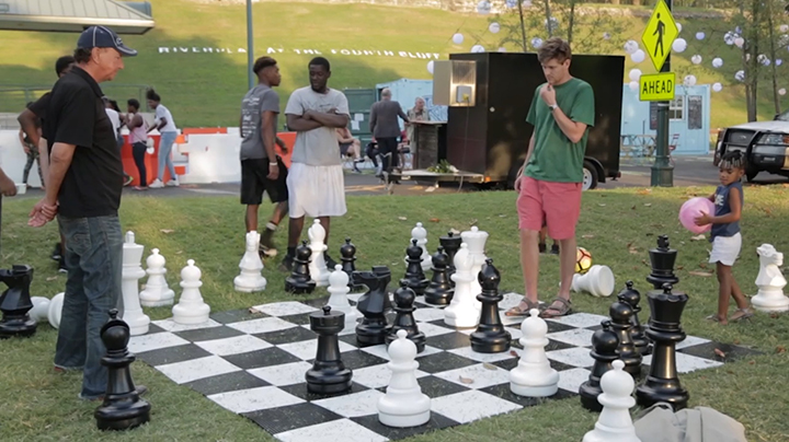 A larger-than-life chess game takes place on the Riverfront as part of a Fourth Bluff activation. (Submitted Fourth Bluff)