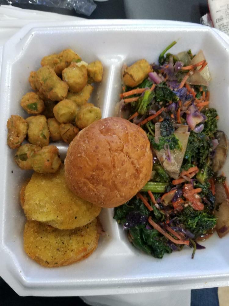 Fried okra, fried green tomatoes, a roll and kale stir fry served at Smooth Living.