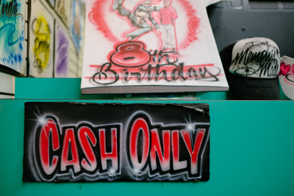 It's cash only at Air Kingz Custom Airbrushing at the Southland Mall. (Brandon Dahlberg)