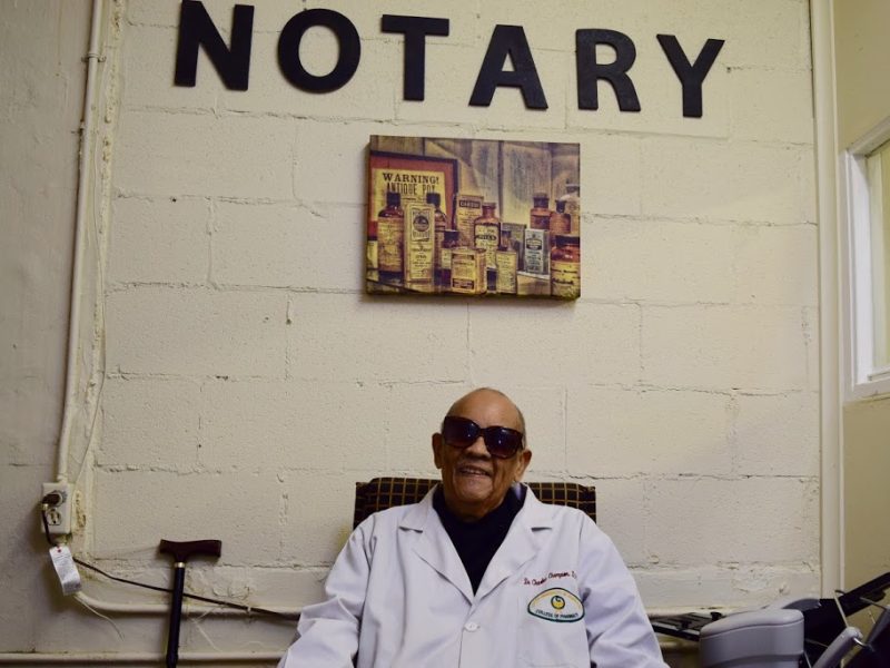 Dr. Charles Champion in his pharmacy office. (Rachel Warren)