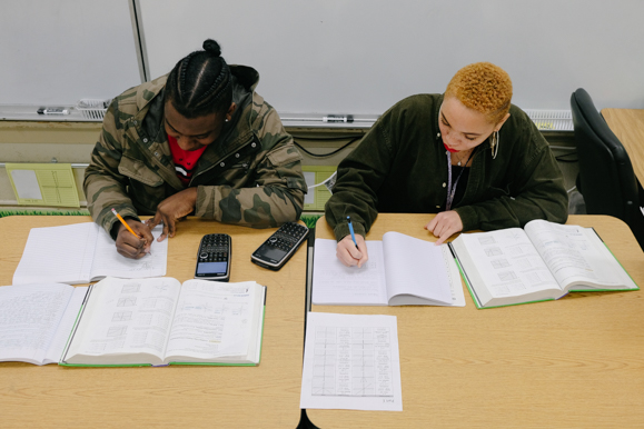 Dewayne Maxwell, 16, and Taiya Hill, 17, at a math class at Whitehaven High School.