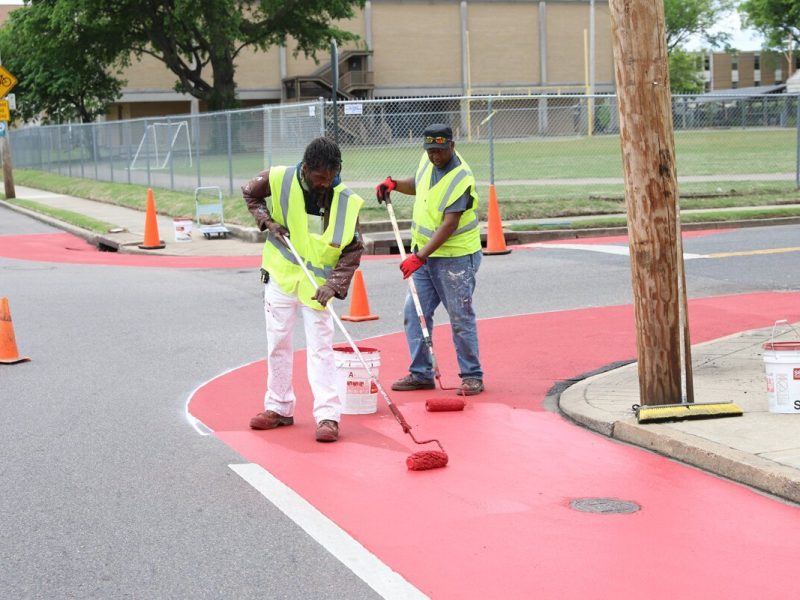 Crew members for the Heights CDC work on traffic calming features to complement the new bioswale construction at Tutwiler and National in 2022. (File photo: Reginald Johnson)