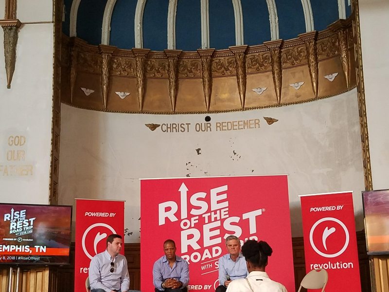 A Memphis resident speaks to J.D. Vance, John Hope Bryant and Steve Case at the May 8 Rise of the Rest pitch competition. (Madeline Faber)