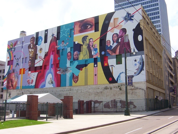 The Note for Hope mural on the side of the Toof Building was created by artist Jeff Zimmerman in 2008
