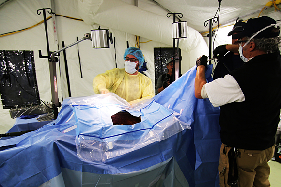 Staff and volunteers participated in a training exercise inside the operating room.
