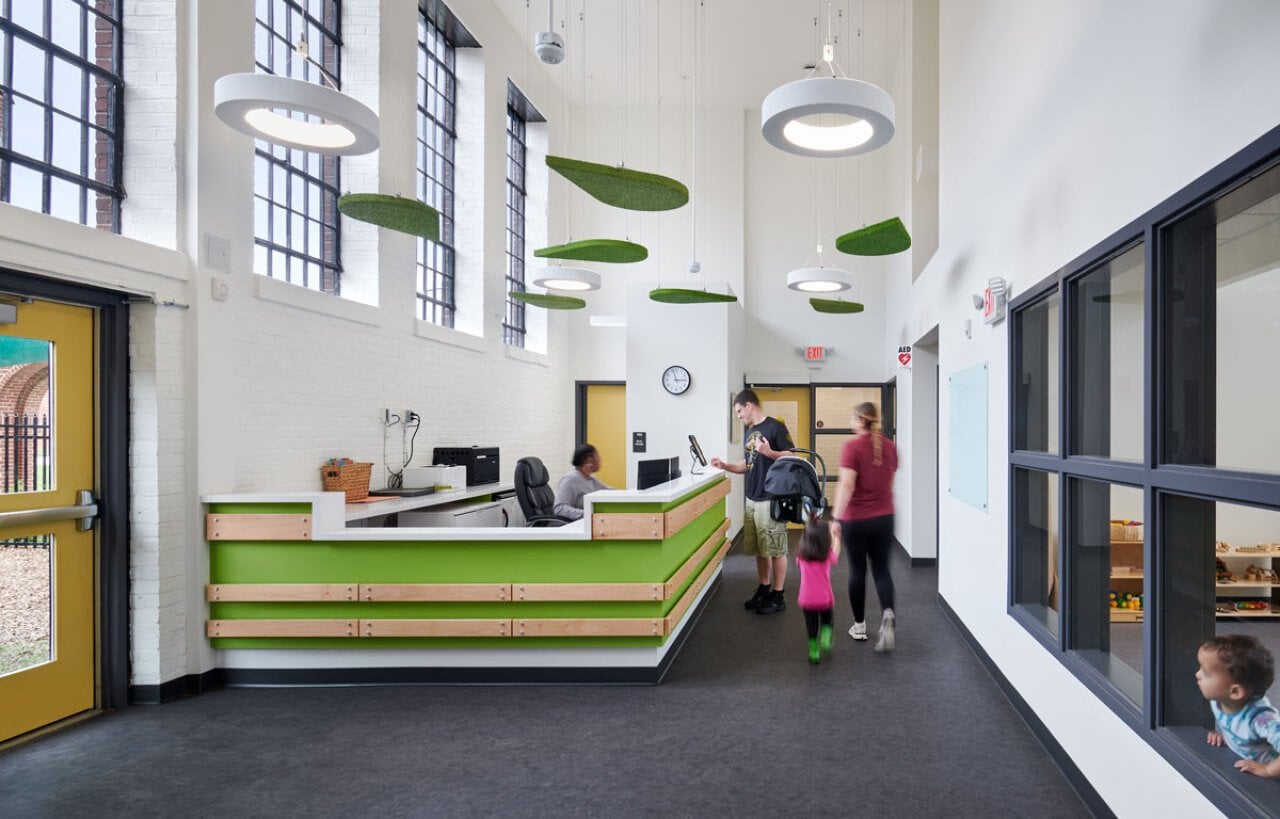 To take full advantage of the natural light coming in from 100 large windows, the architects made cutouts in interior classroom walls and added windows along the corridors. 