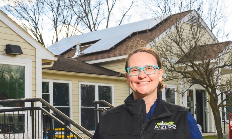 Missy Stults, Ann Arbor's sustainability and innovations director, in front of the Bryant Community Center. Ann Arbor's Bryant neighborhood will be the first to be connected to the city's new Sustainable Energy Utility.